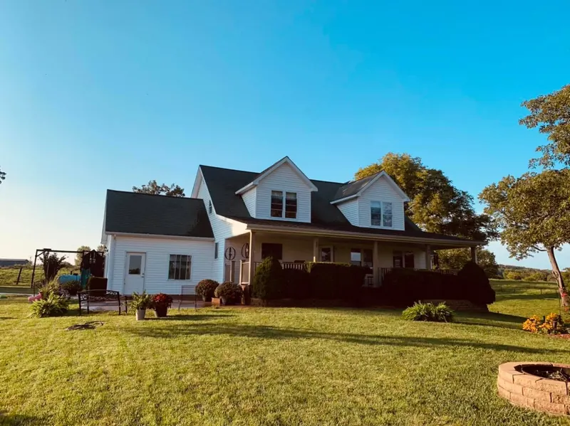 White home with dormers