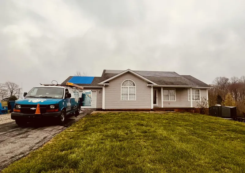Single-story home during a roof cleaning